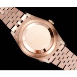 Navigator series men's watch with chocolate dial, rose gold bezel, 42mm case, and rose gold five-link bracelet.